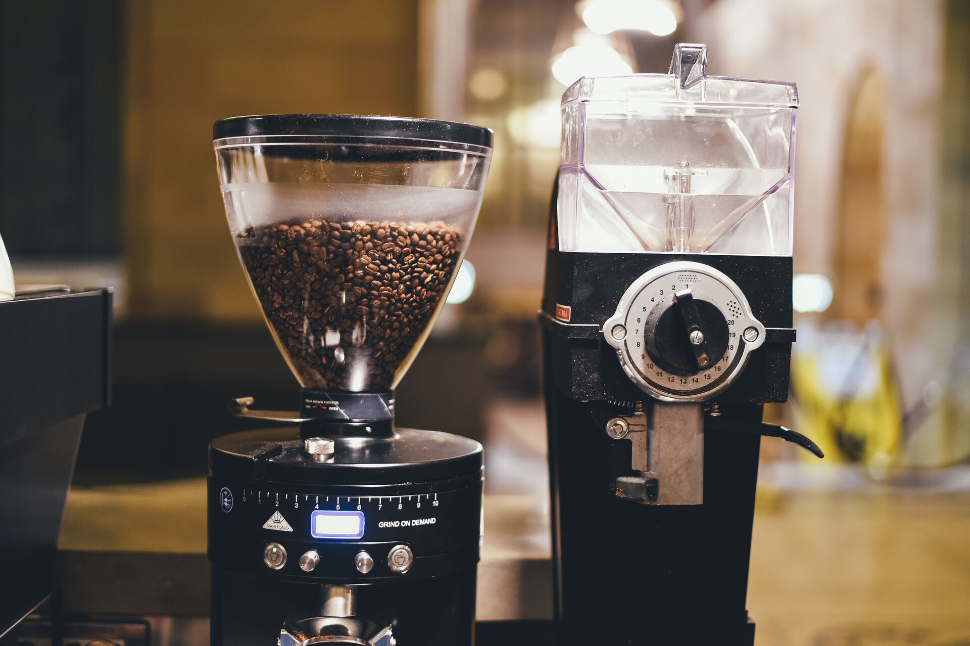 Coffee grinders on a cafe counter