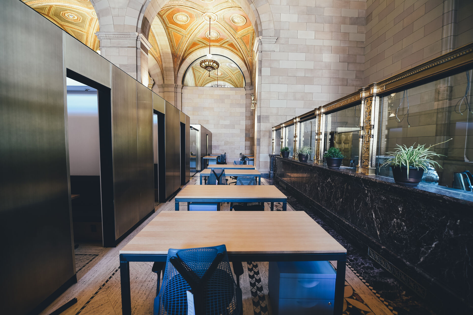 Desks in a quiet office inside a historic hall